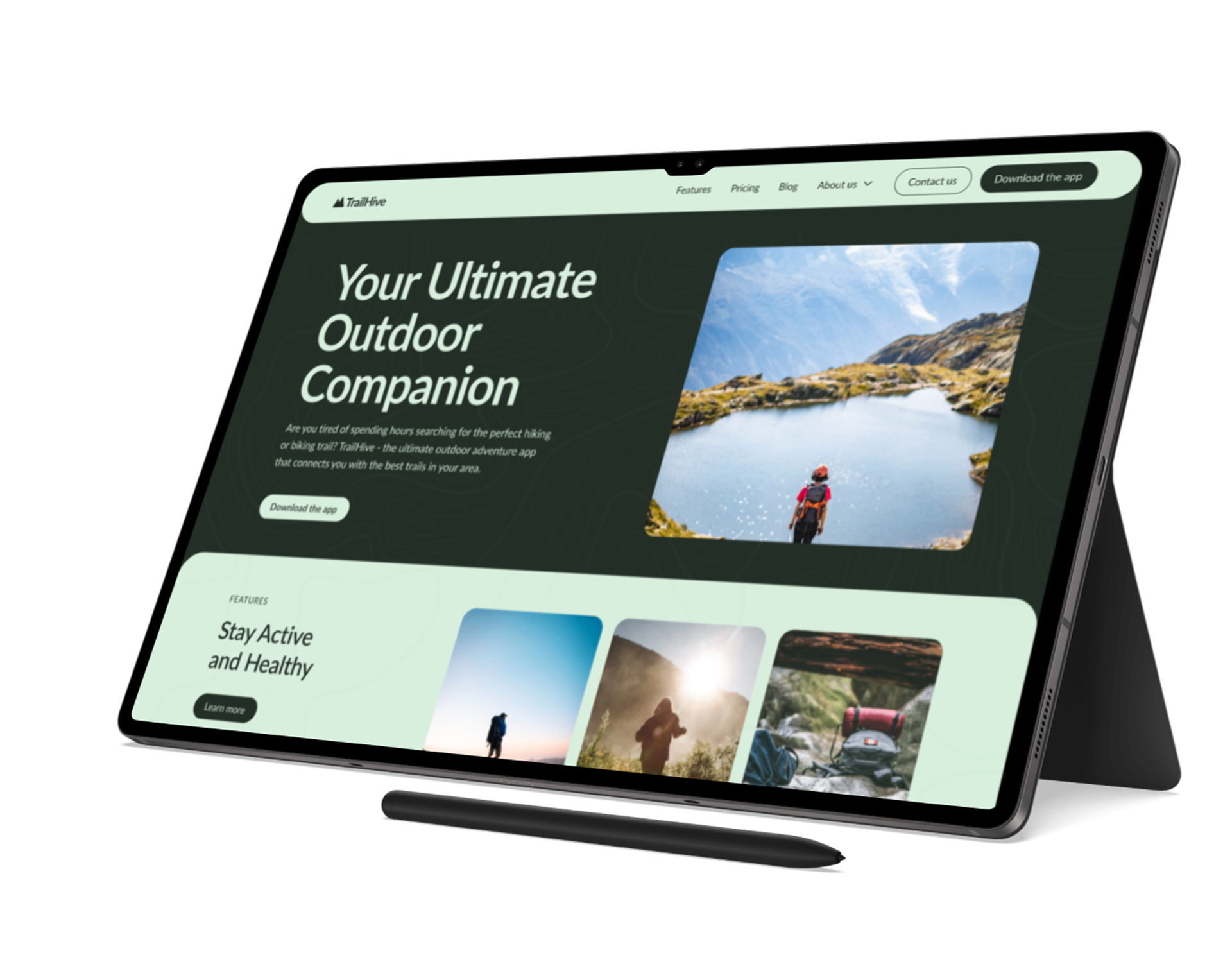 TrailHive homepage shown on a Galaxy Tab — Your Ultimate Outdoor Companion hero with mountain lake imagery